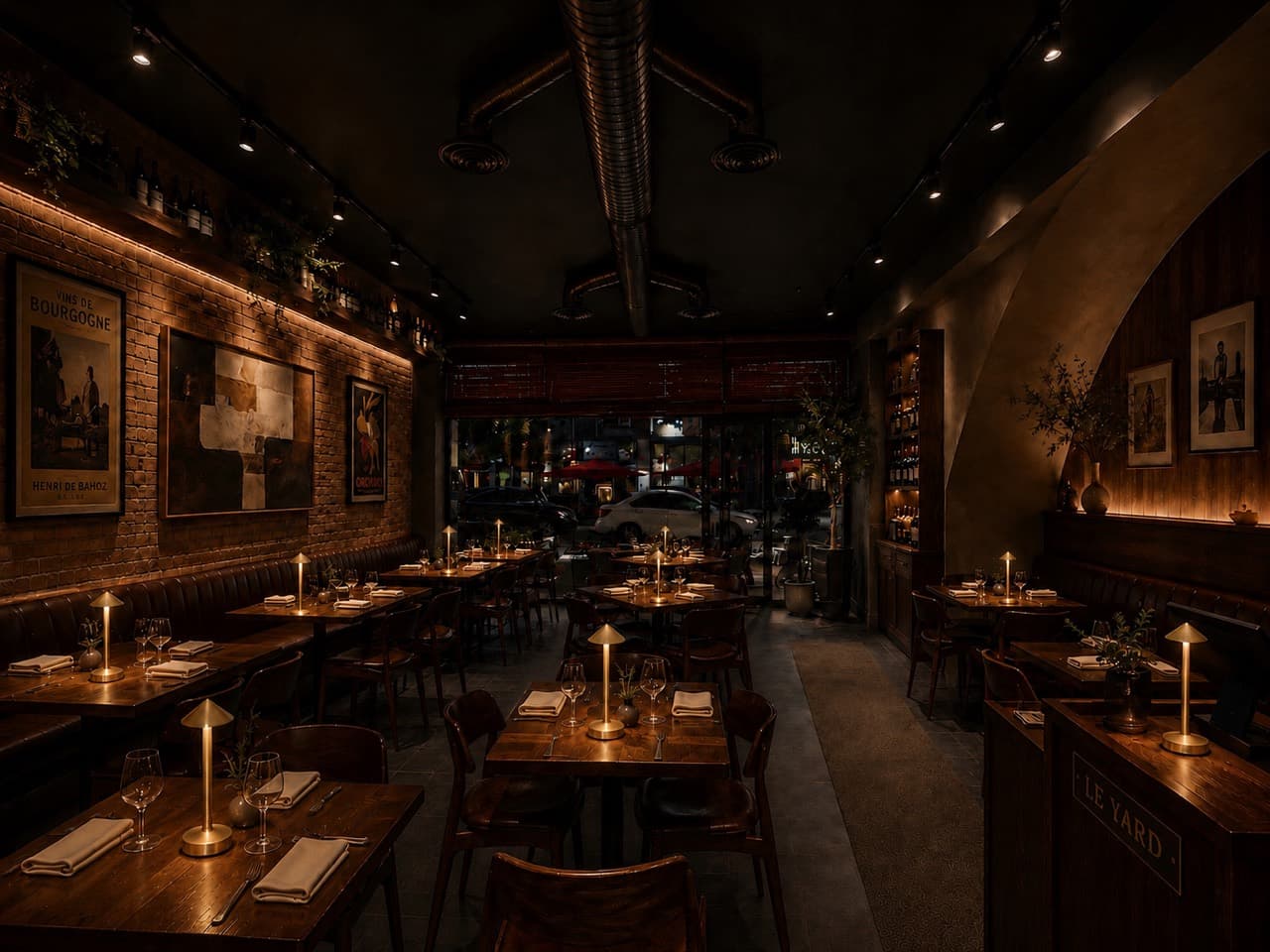 Le Yard’s warm dining room prepared for evening service